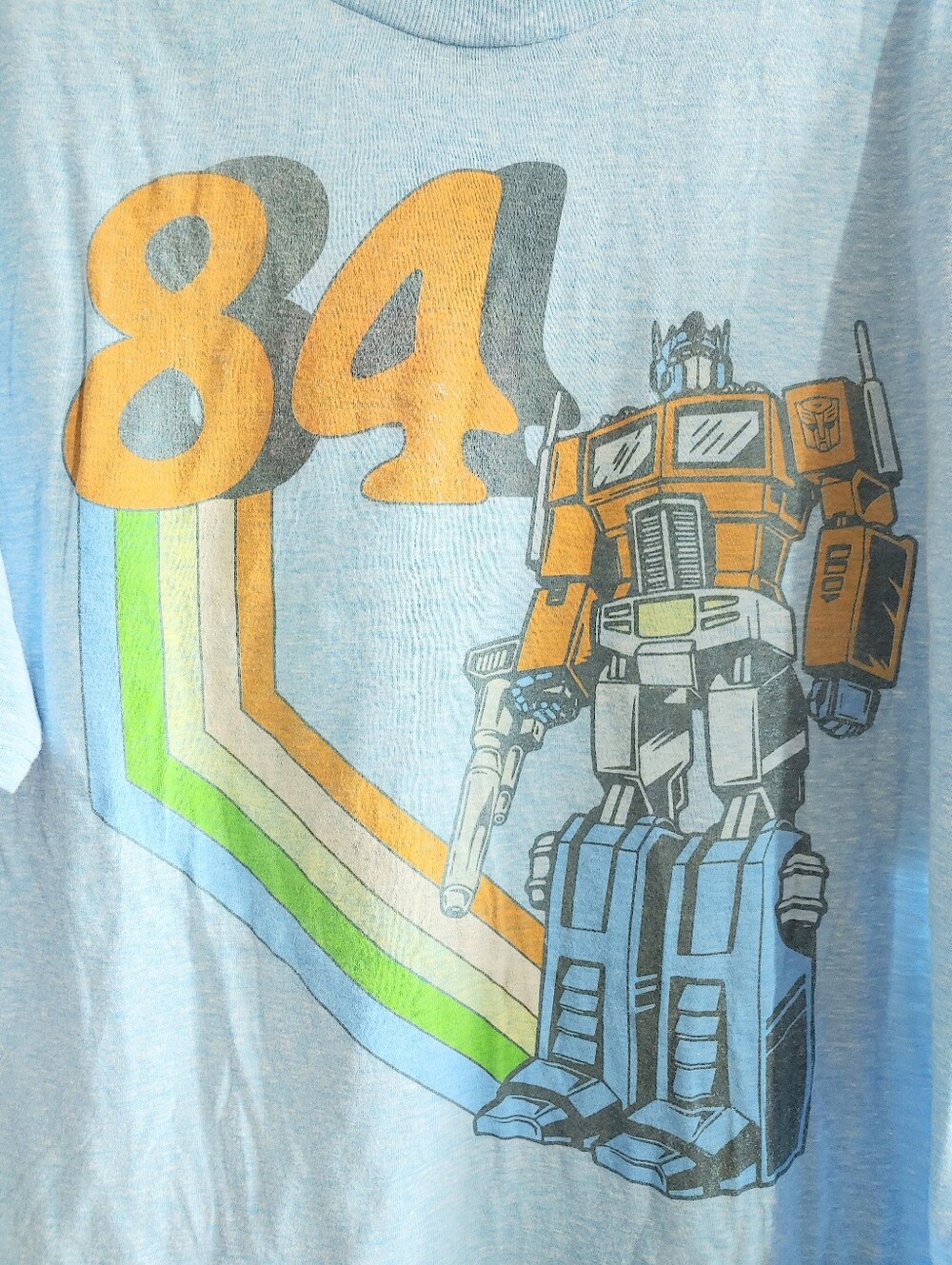 The Transformers 84 Light Blue Vintage-Look Unisex T-Shirt, L sci-fi action toy